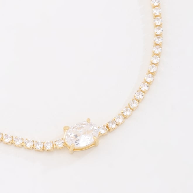 PU-01049 PULSEIRA RIVIERA COM ZIRCÔNIAS CRAVEJADAS E DETALHE CENTRAL EM GOTA