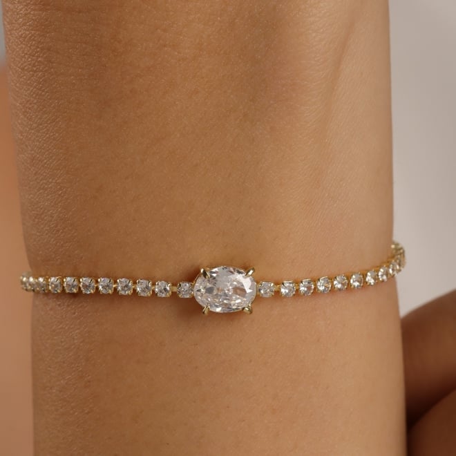 PU-01049 PULSEIRA RIVIERA COM ZIRCÔNIAS CRAVEJADAS E DETALHE CENTRAL EM GOTA