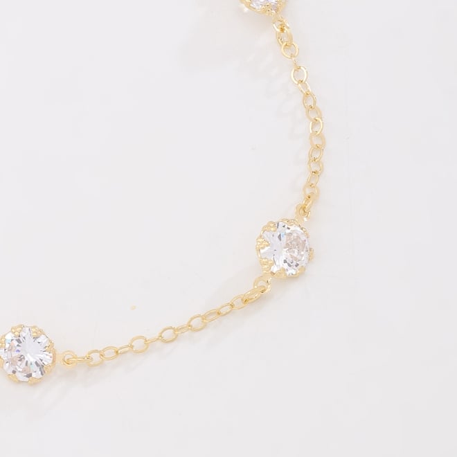 PU-01056-PULSEIRA COM TRÊS ZIRCÔNIAS REDONDAS CRISTAL