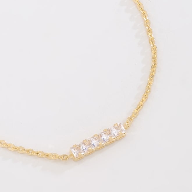PU-01063-PULSEIRA COM DETALHE CENTRAL EM ZIRCÔNIAS