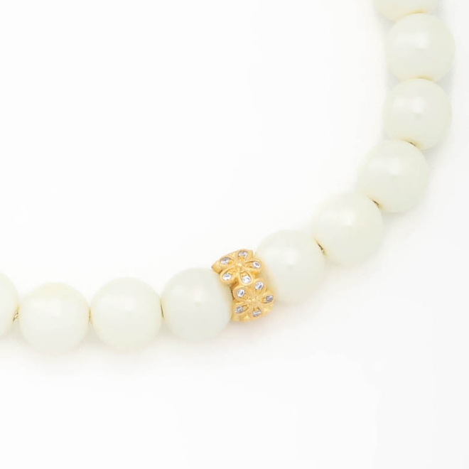PX-0071 PULSEIRA BANHADA A OURO 18K COM PÉROLAS E DETALHE CENTRAL EM ZIRCÔNIAS