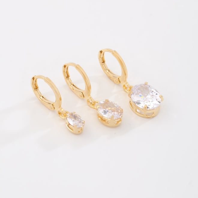TAQ-00016 TRIO DE ARGOLAS BANHADAS A OURO 18K COM PINGENTES EM ZIRCÔNIAS