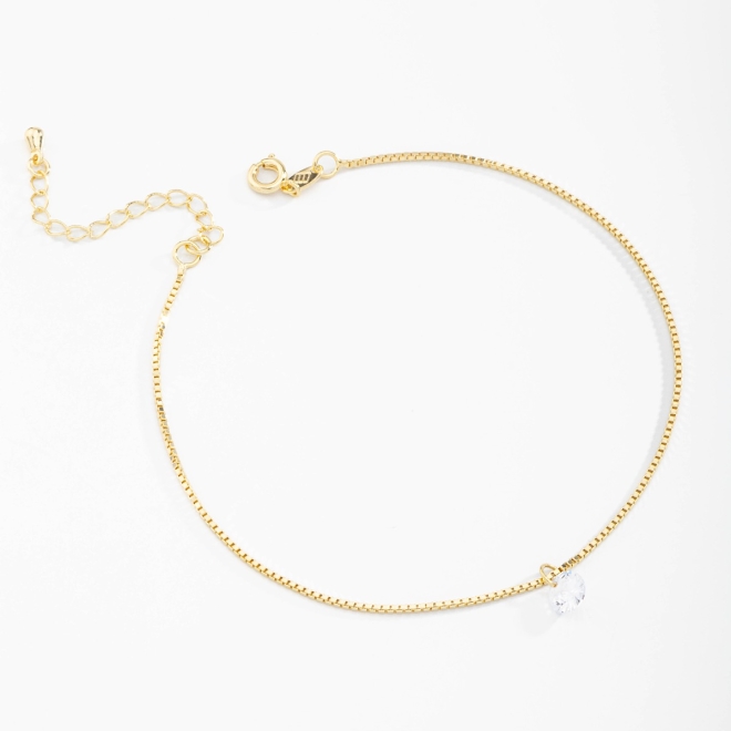 TN-00003 TORNOZELEIRA BANHADA A OURO 18K COM CORRENTE VENEZIANA E PINGENTE DE ZIRCÔNIA